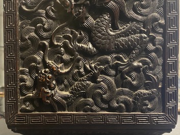 Un petit cabinet en bois sculpt&eacute; &agrave; d&eacute;cor de dragons, Chine, R&eacute;publique